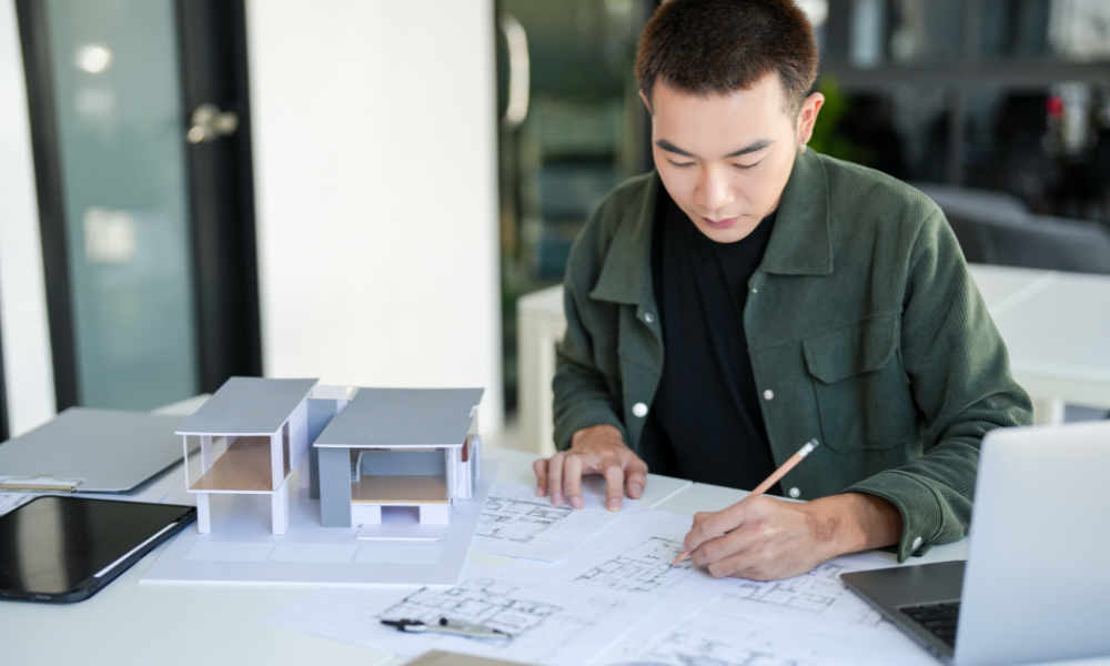 Alt-text- residential architect working with an international design team